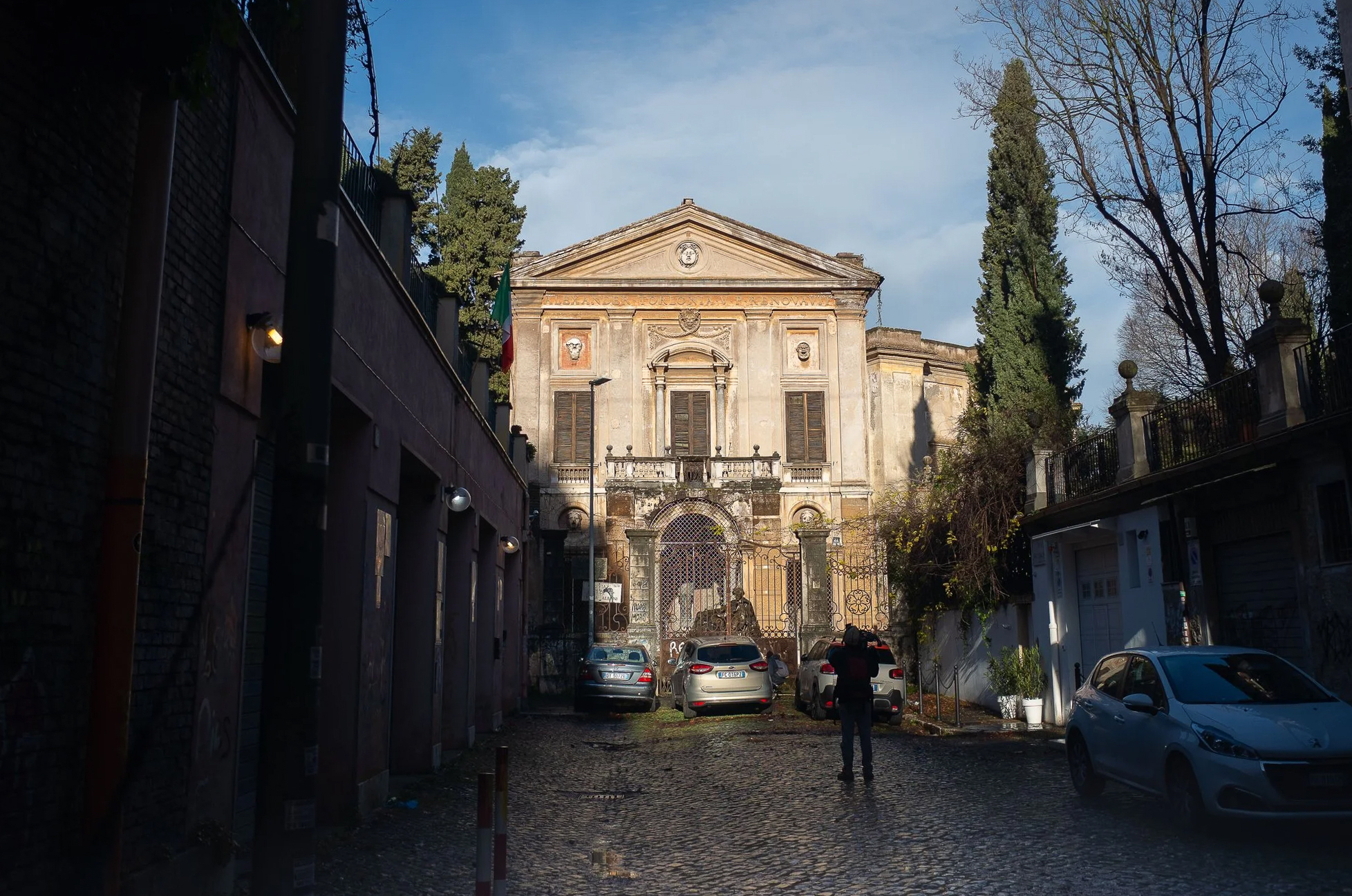 The Kaffeehaus facade at Villa Albani illuminated by morning sunlight